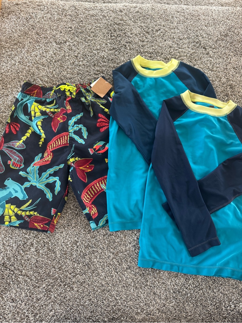 Kids Tea Collection swim trunks NWT size 8.  Rashguards size 8 GUC and play
